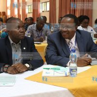 Interior Principal Secretary Karanja Kibicho, right, and Cabinet Secretary for ICT Joe Mucheru