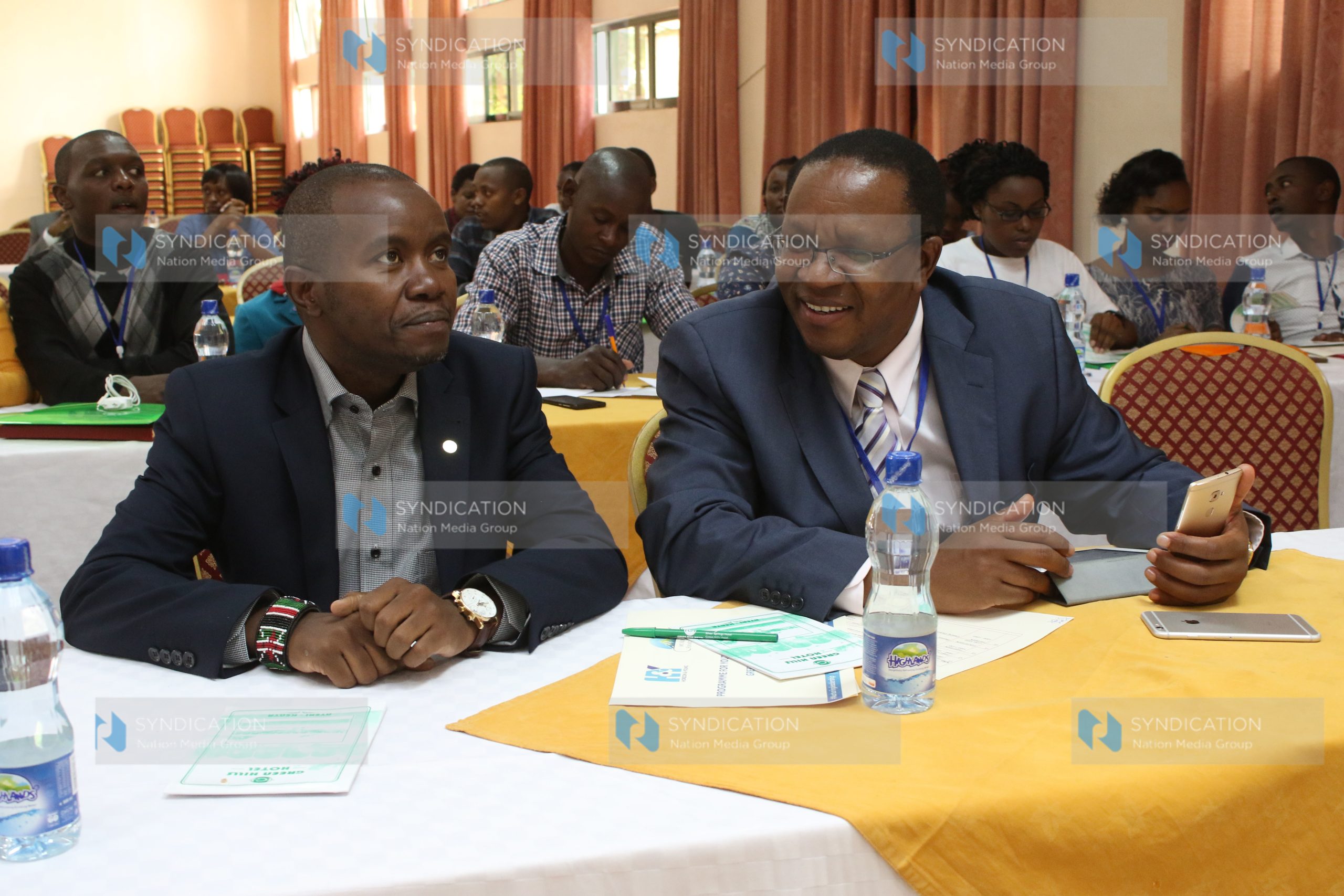Interior Principal Secretary Karanja Kibicho, right, and Cabinet Secretary for ICT Joe Mucheru