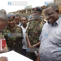 Sports CS Salim Mvurya and KDF officers review a new design for Ruring'u Stadium