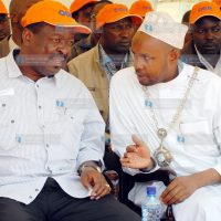 Deputy Prime Minister Musalia Mudavadi confers with Nakuru Mayor Mohamed Suraw