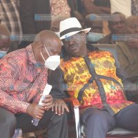 ODM Chairman John Mbadi consult his party leader Raila Odinga