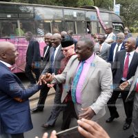 Gideon Moi shaking hands with Cleophas Malala as they marched to Milimani Law Courts