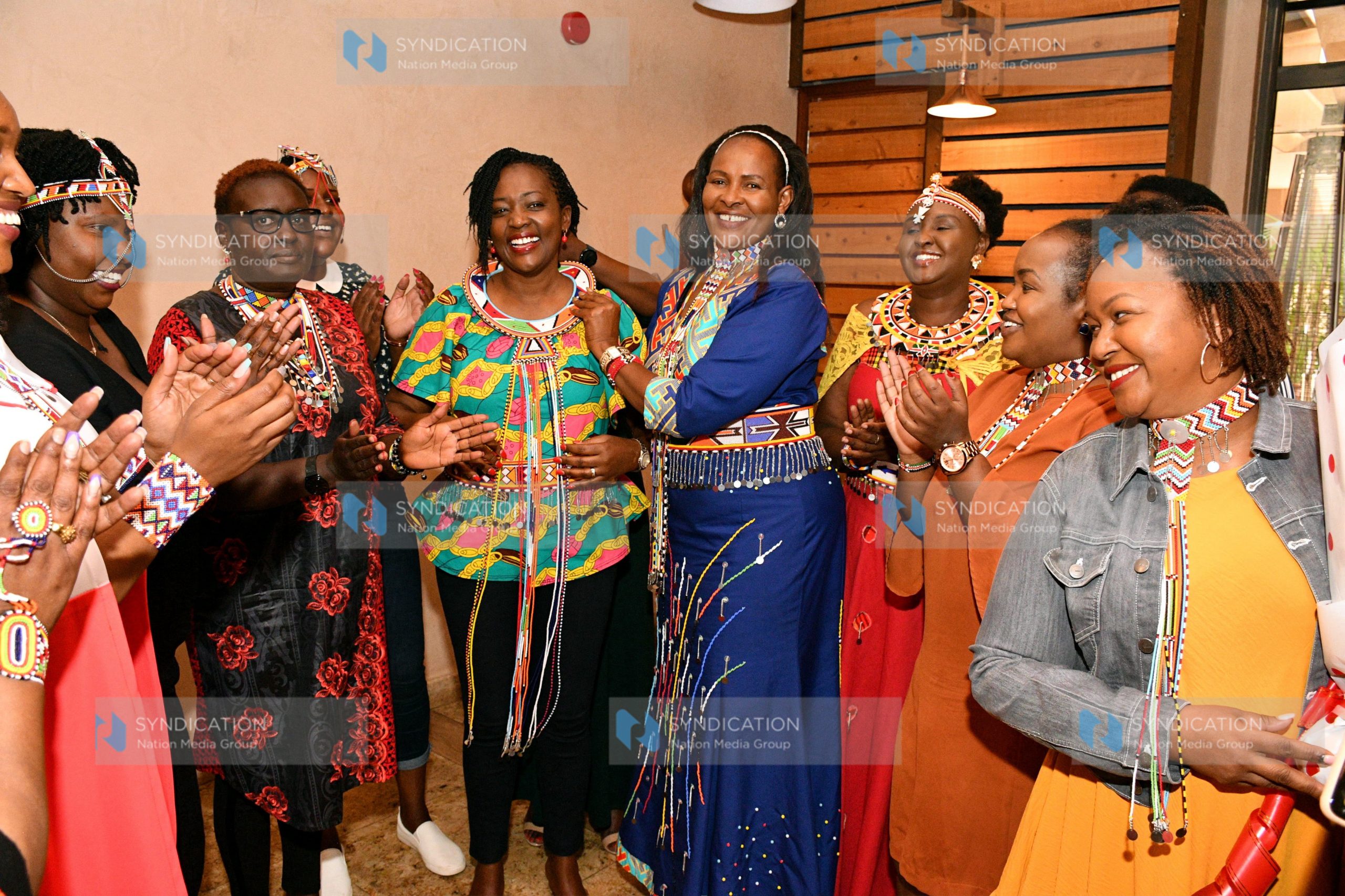 Women leaders and businesswomen from the larger Maasai community