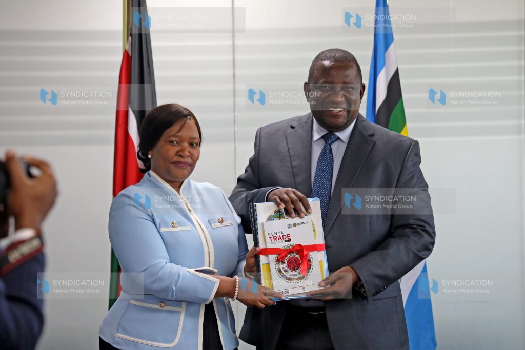 Tourism Cabinet Secretary Rebecca Miano hand over the Investments, Trade and Industry Cabinet Secretary docket to Salim Mvurya