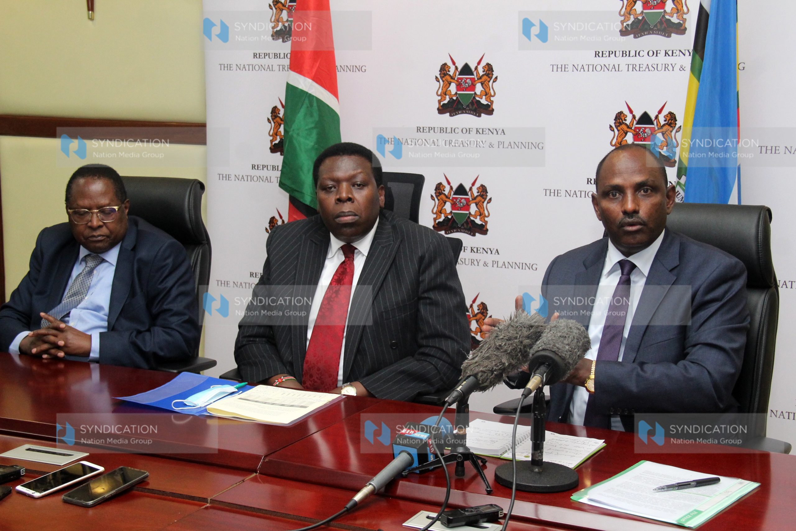 National Treasury and Planning Cabinet Secretary Ukur Yatani, Devolution Cabinet Secretary Eugene Wamalwa, and Council of Governors Chair Martin Wambora