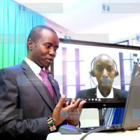 ICT CS Joe Mucheru during the Standard Chartered Bank Video and Banking services launch