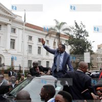 Embu Governor Martin Wambora celebrates with his supporters outside the Court of Appeal