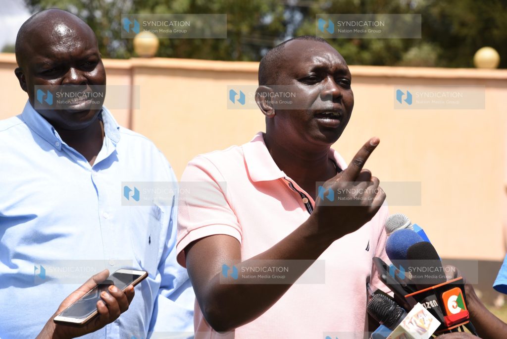 Kapseret MP Oscar Sudi, accompanied by former Wareng County Council Chairman Paul Kiprop, during a press conference