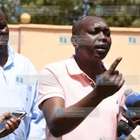 Kapseret MP Oscar Sudi, accompanied by former Wareng County Council Chairman Paul Kiprop, during a press conference