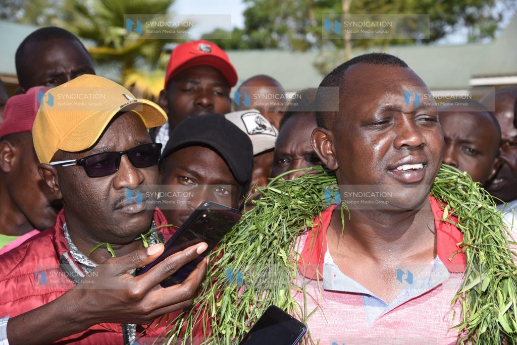 Kapseret MP Oscar Sudi (right) addresses the press after winning the United Democratic Alliance (UDA) Party ticket