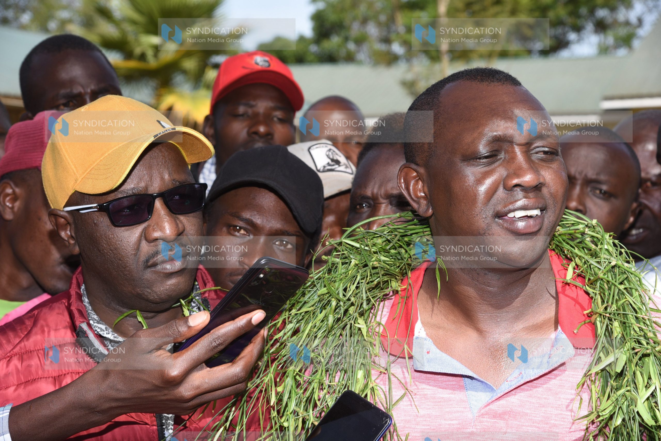 Kapseret MP Oscar Sudi (right) addresses the press after winning the United Democratic Alliance (UDA) Party ticket