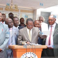 Governor Martin Wambora addresses the press outside his office