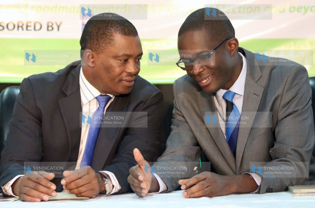 Speaker of the National Assembly Justin Muturi having a word with IEBC CEO Ezra Chiloba