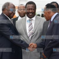 President Mwai Kibaki is received by Deputy Prime Minister and Minister for Local Government Musalia Mudavadi and Internal Security Minister George Saitoti