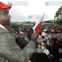 Chepalungu MP Isaac Ruto reads a clause on land from the draft constitution