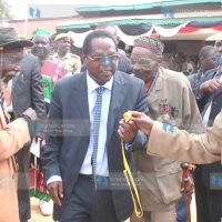 Embu Governor Martin Wambora chats with Eastern Deputy Provincial Commissioner Beverly Opwora and former freedom fighter Peter Nyaga