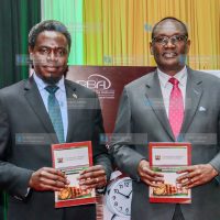 Retirement Benefits Authority Chairman Nelson Havi and National Treasury Principal Secretary Chris Kiptoo