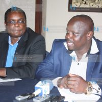 Council of Governors Chair Isaac Ruto (right) confers with Bungoma Governor Kenneth Lusaka during a press conference