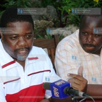 Chairman of the Parliamentary Committee on Education David Koech listens to his Chepalungu counterpart Isaac Ruto