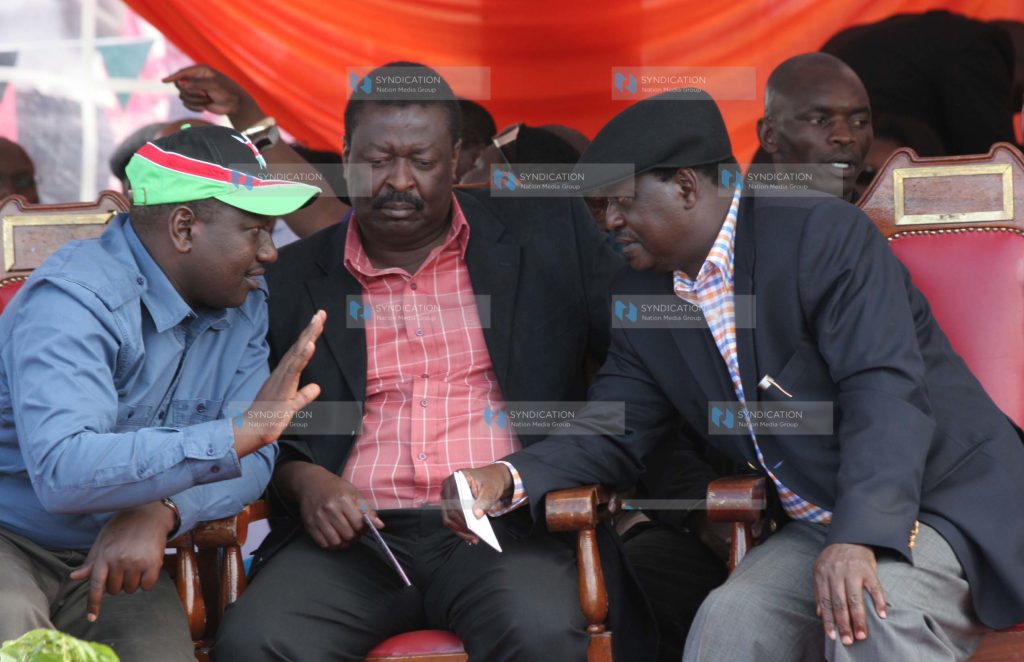 Prime Minister Raila Odinga, with Musalia Mudavadi and William Ruto