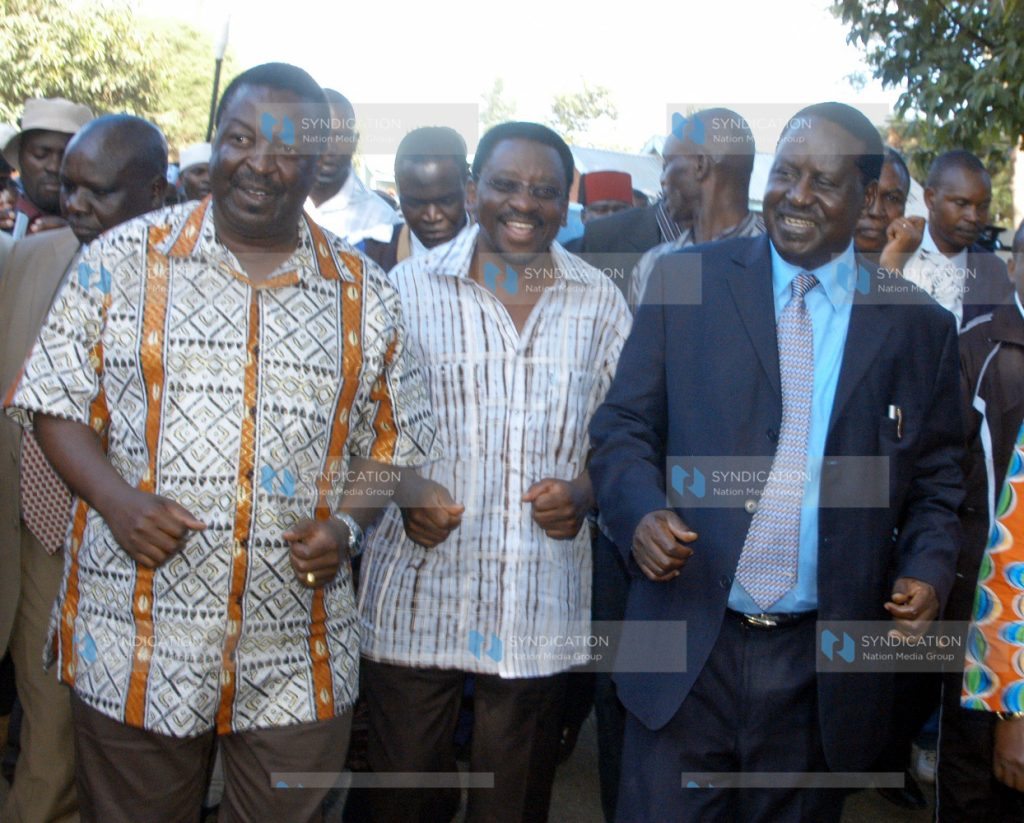 Prime Minister Raila Odinga, his Deputy Musalia Mudavadi, and Lands Minister James Orengo