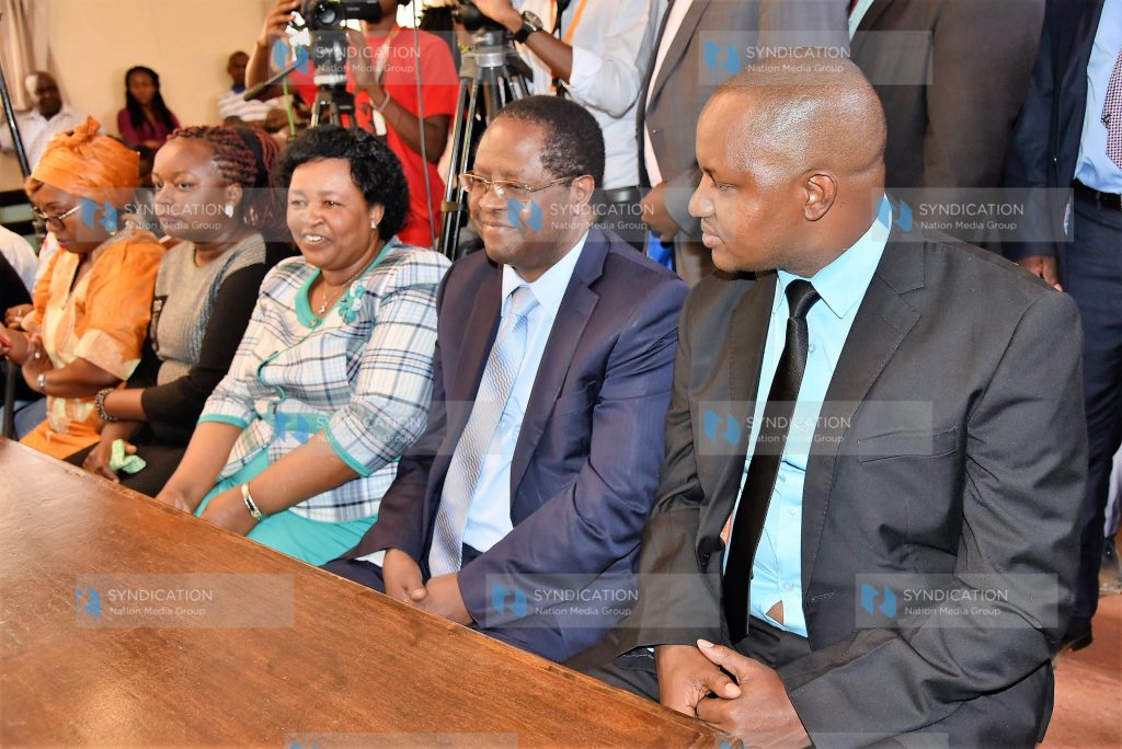 Embu Governor Martin Wambora (second right), his deputy David Kariuki (right), and Wambora's wife Teresa appear in court