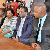 Embu Governor Martin Wambora (second right), his deputy David Kariuki (right), and Wambora's wife Teresa appear in court