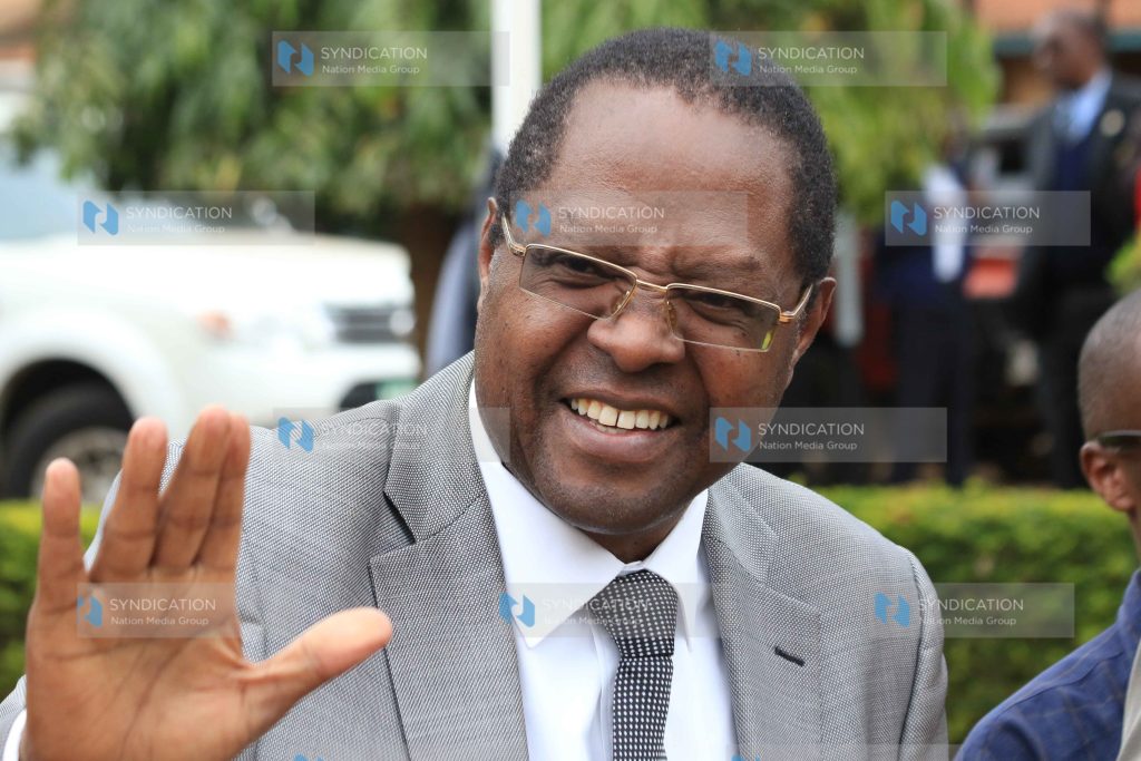 Embu governor Martin Wambora interacts with MCAs outisde the Embu county assembly