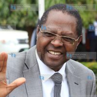 Embu governor Martin Wambora interacts with MCAs outisde the Embu county assembly
