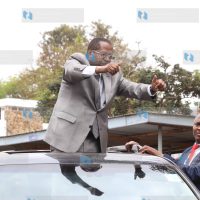 Embu Governor Martin Wambora acknowledges greetings from wananchi