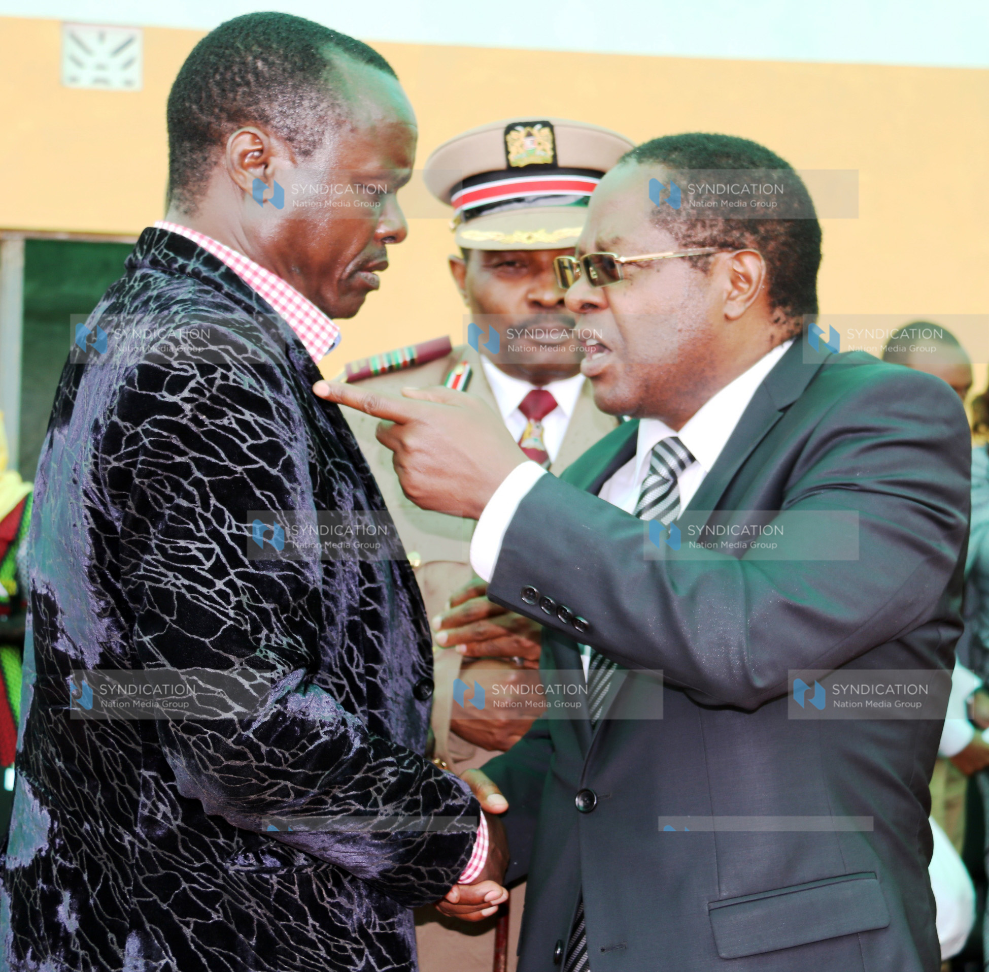 Embu Governor Martin Wambora chats with Embu Senator Lenny Kivuti