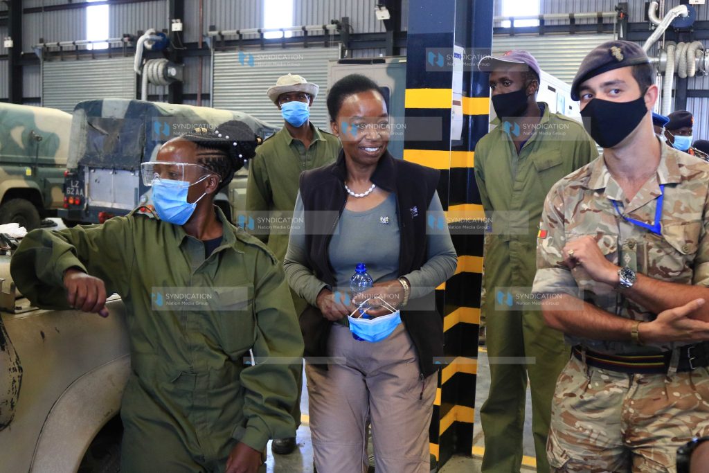 Cabinet Secretary for Defence Monica Juma inspects a mechanical workshop
