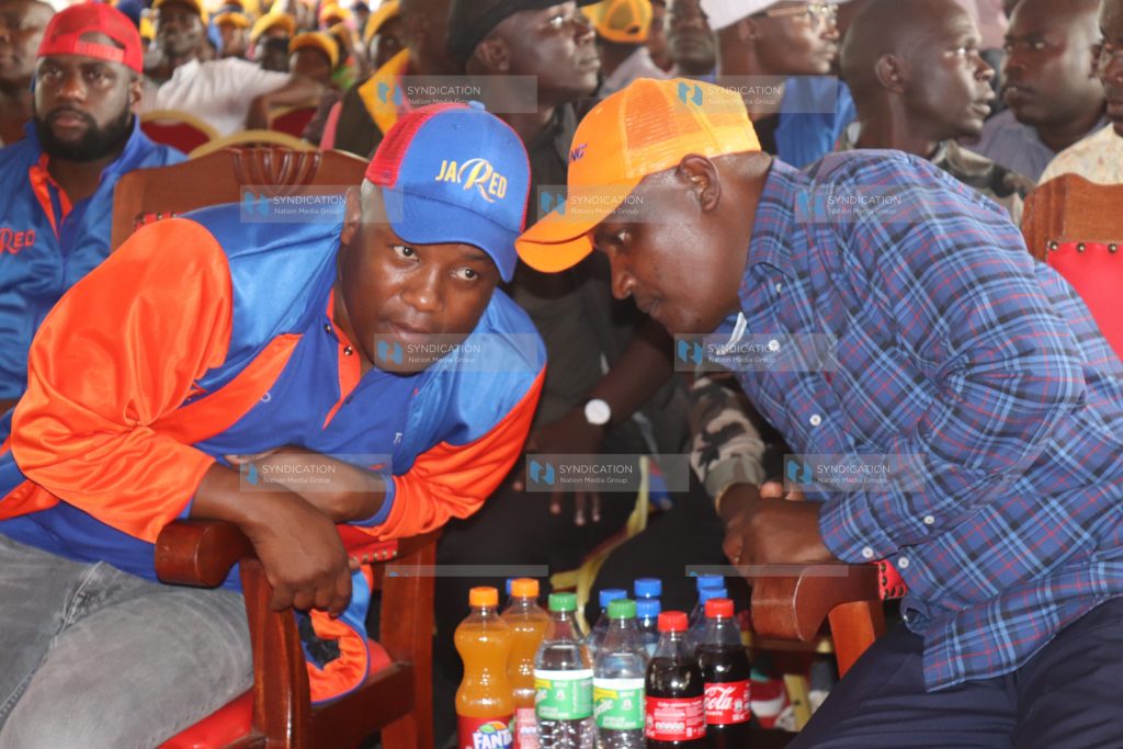 ODM National Chairman John Mbadi converse with businessman Jared Kiasa