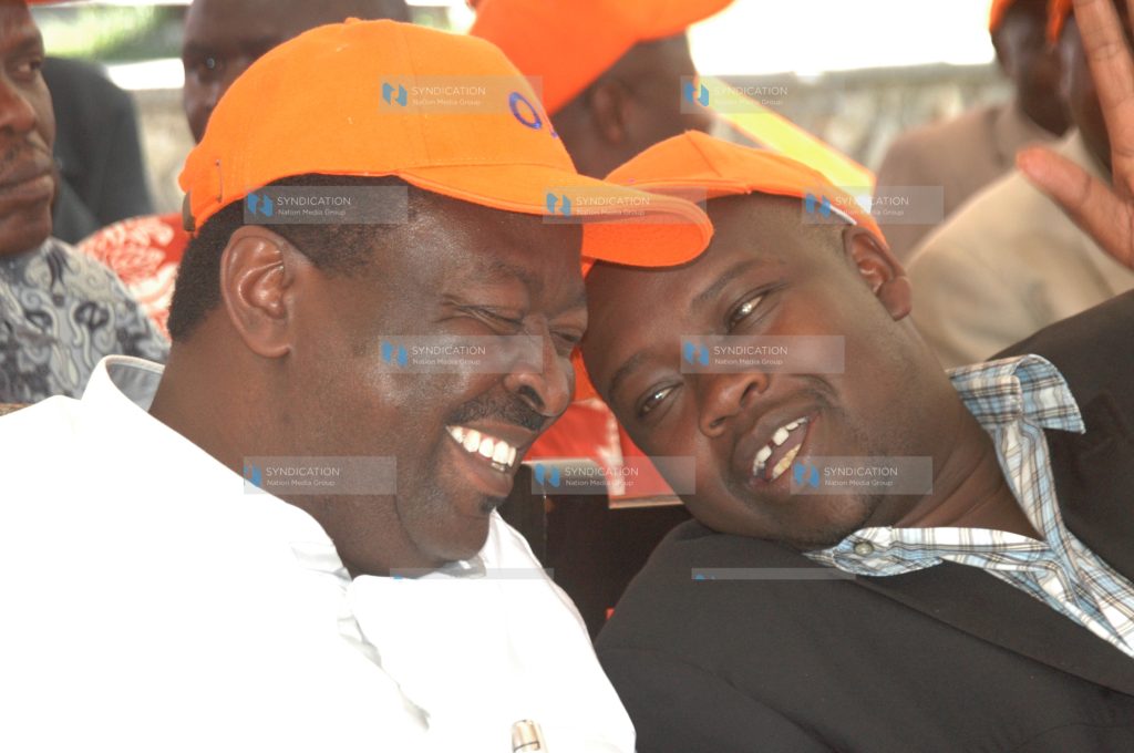 Deputy Prime Minister Musalia Mudavadi consults with Energy Assistant Minister Mager Langat