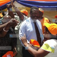 Deputy Prime Minister Musalia Mudavadi dances during a meeting with delegates