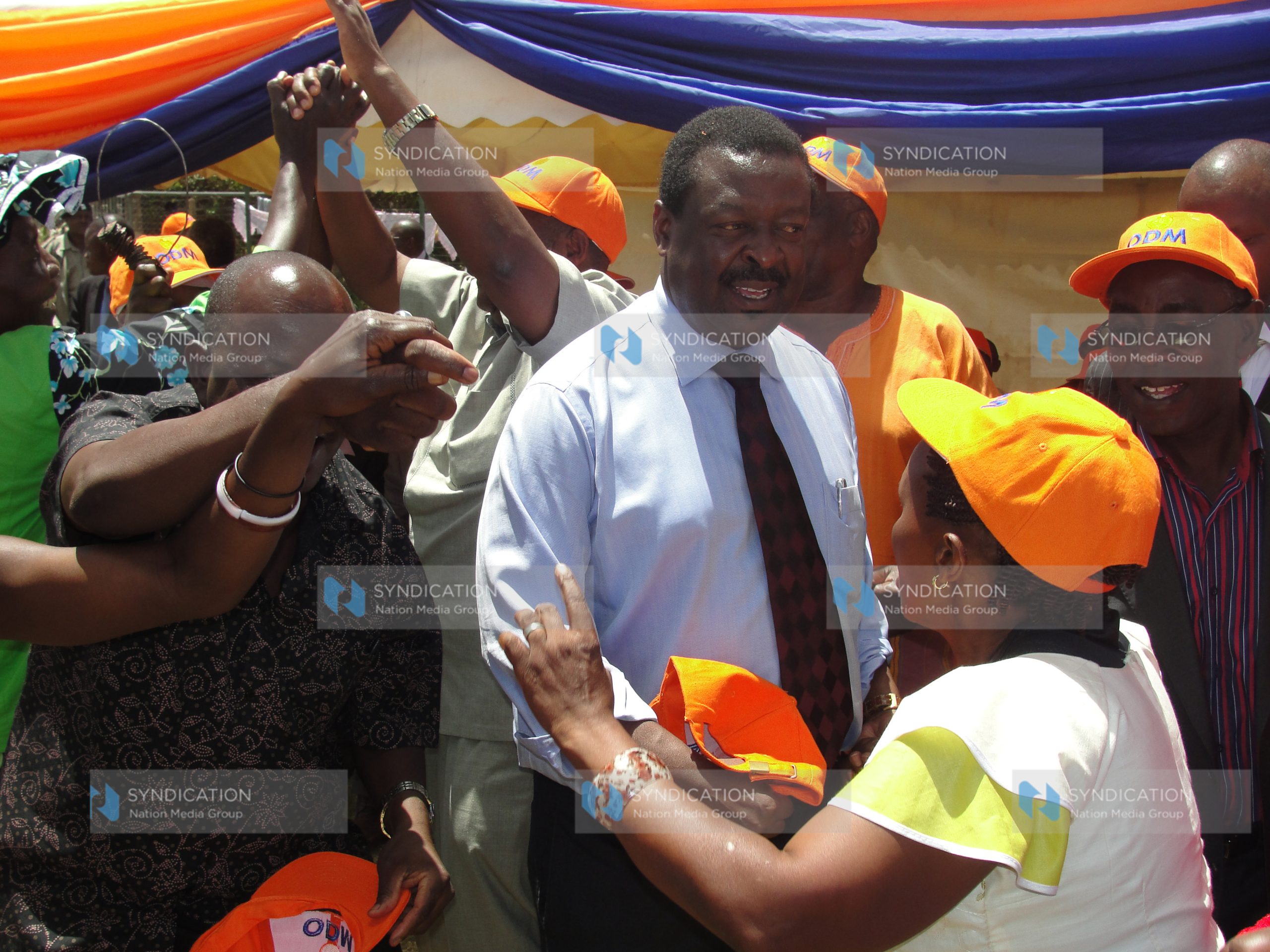 Deputy Prime Minister Musalia Mudavadi dances during a meeting with delegates