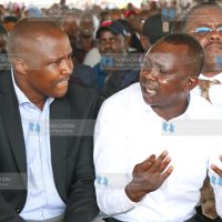 Former Nandi Hills MP Alfred Keter converses with Kapseret MP Oscar Sudi