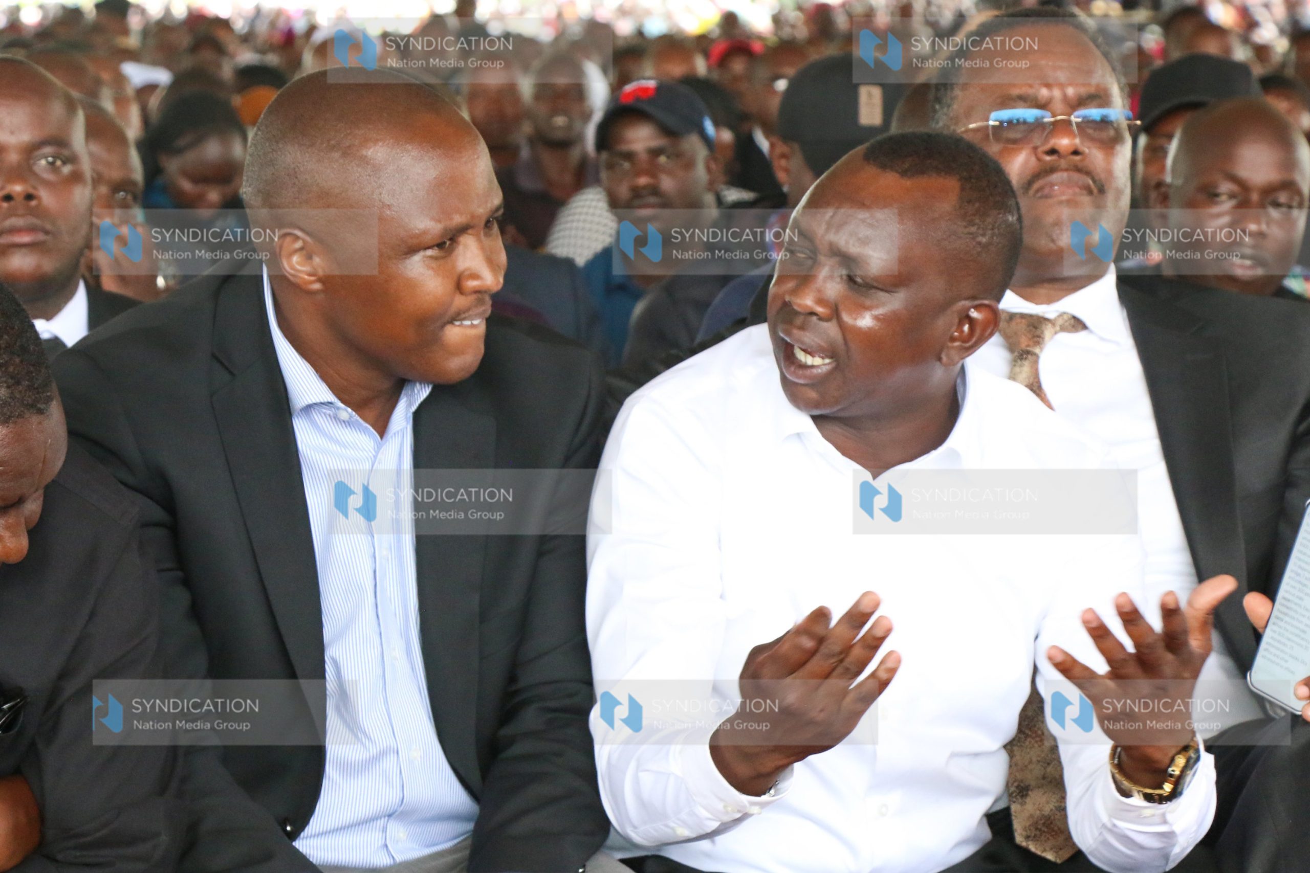 Former Nandi Hills MP Alfred Keter converses with Kapseret MP Oscar Sudi