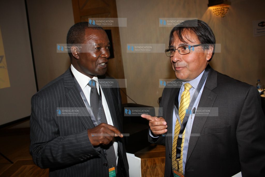 Resident representative of International Monetary Fund Armando Morales with Former Governor of Central Bank of Kenya Njuguna Ndung'u
