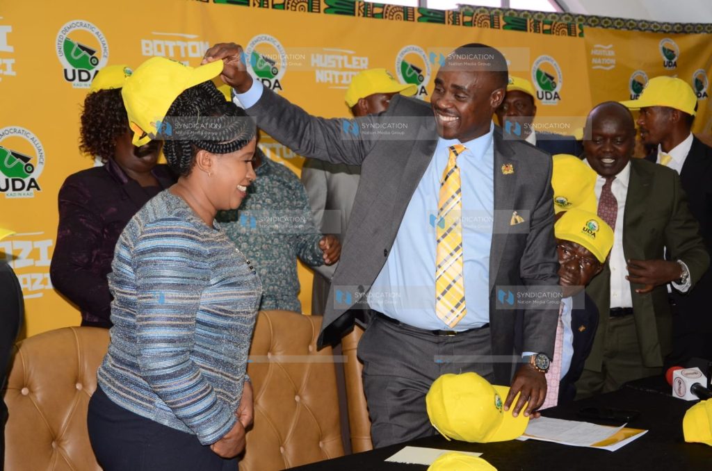 United Democratic Alliance (UDA) Party Secretary General Cleophas Malala receives Ms. Rita Ndunge