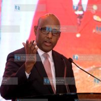 Cabinet Secretary, Industry, Trade and Cooperatives, Adan Mohamed speaks during a luncheon