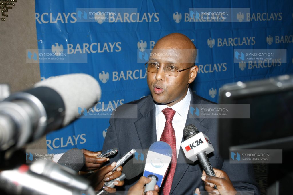 Barclays Bank of Kenya Managing Director Adan Mohammed address the media