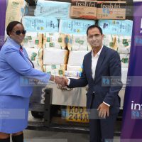 Beatrice Elachi receives a food donation worth KES 350,000
