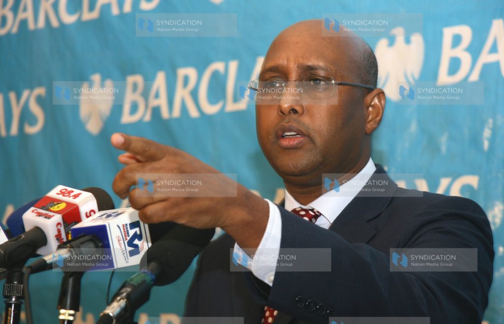 Adan Mohamed announcing bank's financial performance for 2011