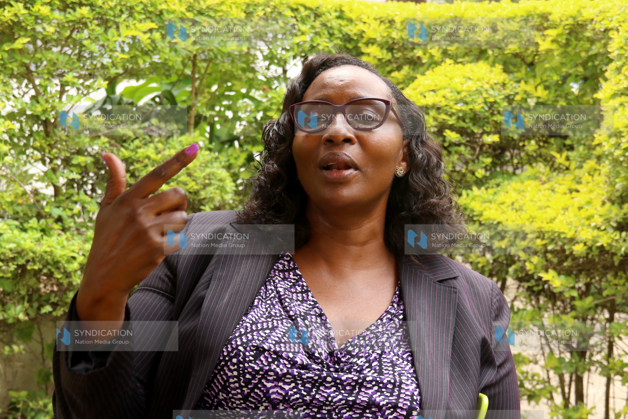 Gender Chief Administrative Secretary (CAS) Beatrice Elachi gestures during the interview
