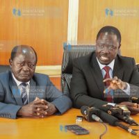 Homa Bay Town MP George Peter Opondo Kaluma (right) and Karachuonyo MP Andrew Adipo Okuome addressing the media