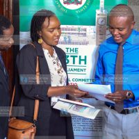 Kuria Kimani, shares a word with Architectural Association of Kenya President Florence Nyole and Vice President George Ndege