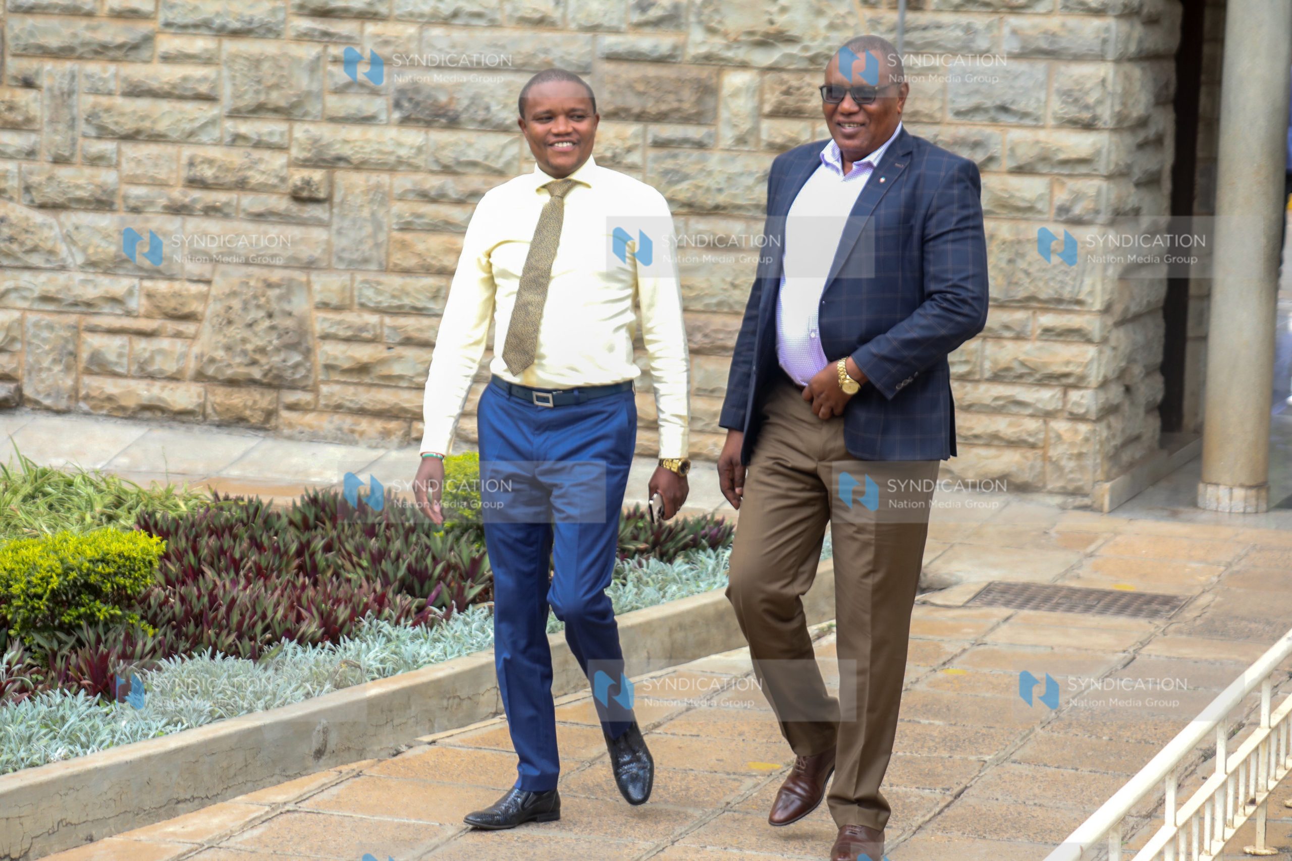 Kimani Kuria (Left) and Kitui Rural Mboni David Mwalika at Parliament buildings