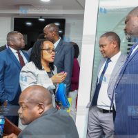 Finance and National Planning, Kuria Kimani (centre)