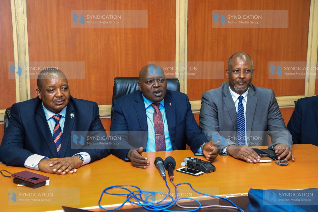 A section of UDA legislators led by Nandi Senator Samson Kiprotich Cherarkey (centre) Saku MP Rasso Dido Ali (right) and Baringo North MP Joseph Makilap (left) after addressing media